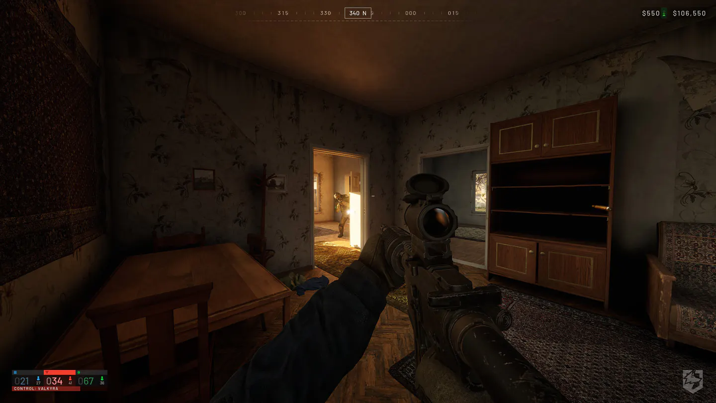 WARDOGS player moving through a damaged house interior during a firefight