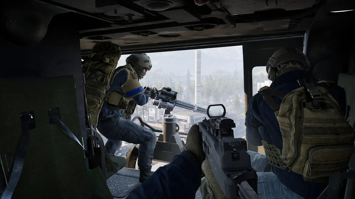 WARDOGS squad riding together inside a helicopter over an industrial battlefield